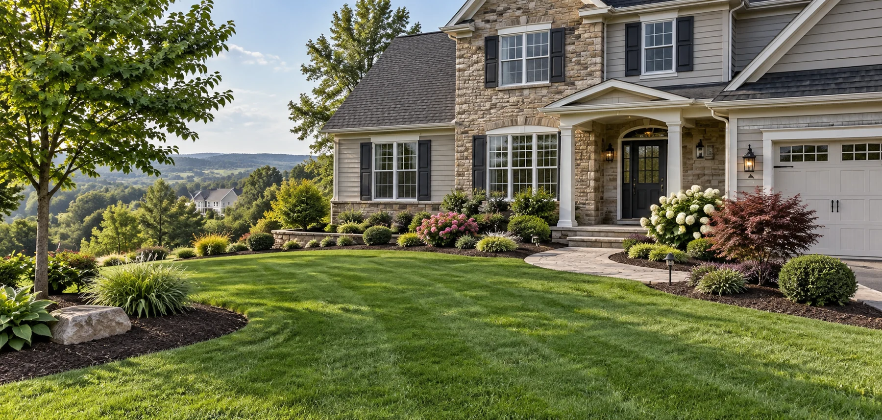 Illustrative image: lawn and freshly mulched garden beds